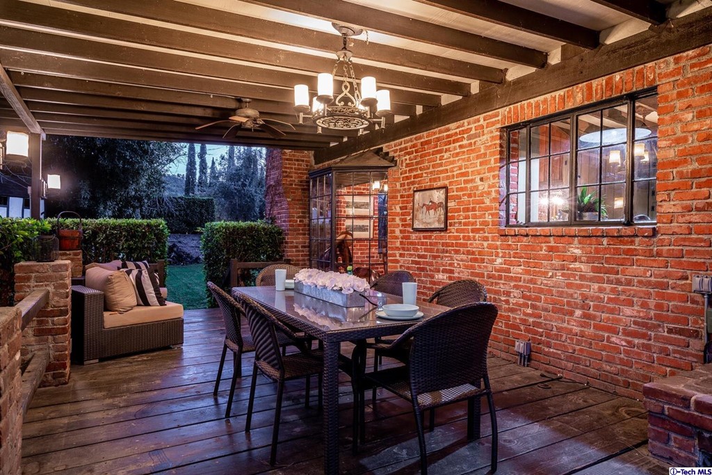 1705 Rancho Avenue Glendale, CA 91201 - Photo 13 of 53 a view of a dinning table and chairs in the patio