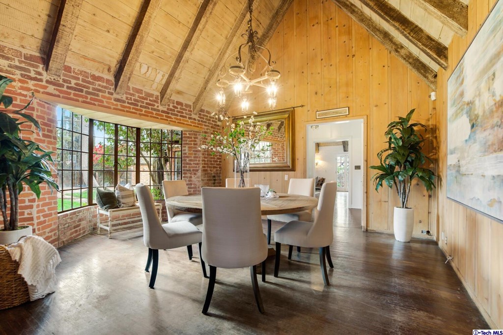 1705 Rancho Avenue Glendale, CA 91201 - Photo 20 of 53 a dining room with furniture a chandelier and wooden floor