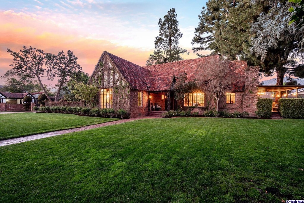 1705 Rancho Avenue Glendale, CA 91201 - Photo 3 of 53 a view of a house with a big yard plants and large trees