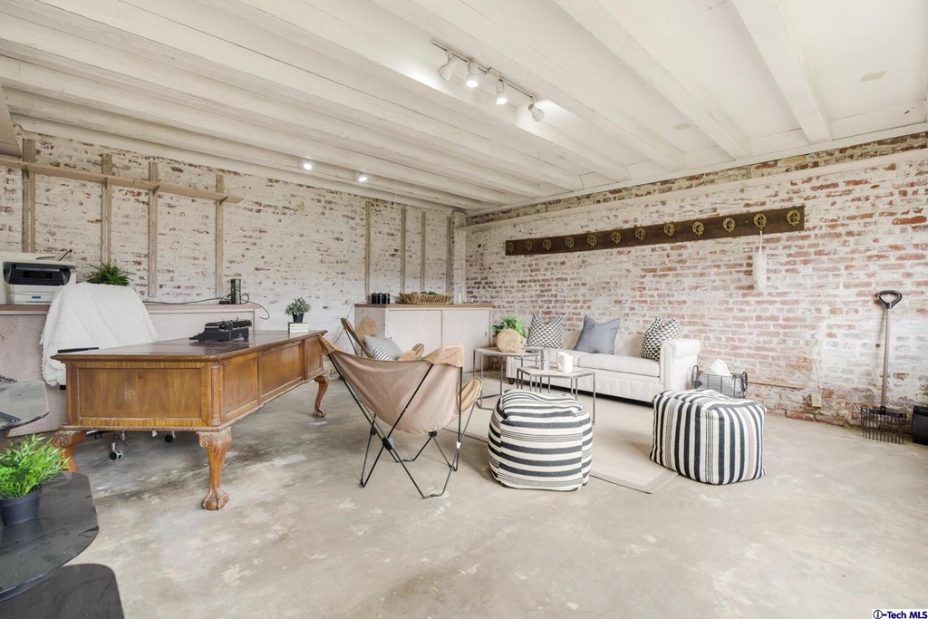 1705 Rancho Avenue Glendale, CA 91201 - Photo 38 of 53 a living room with patio furniture and a fireplace