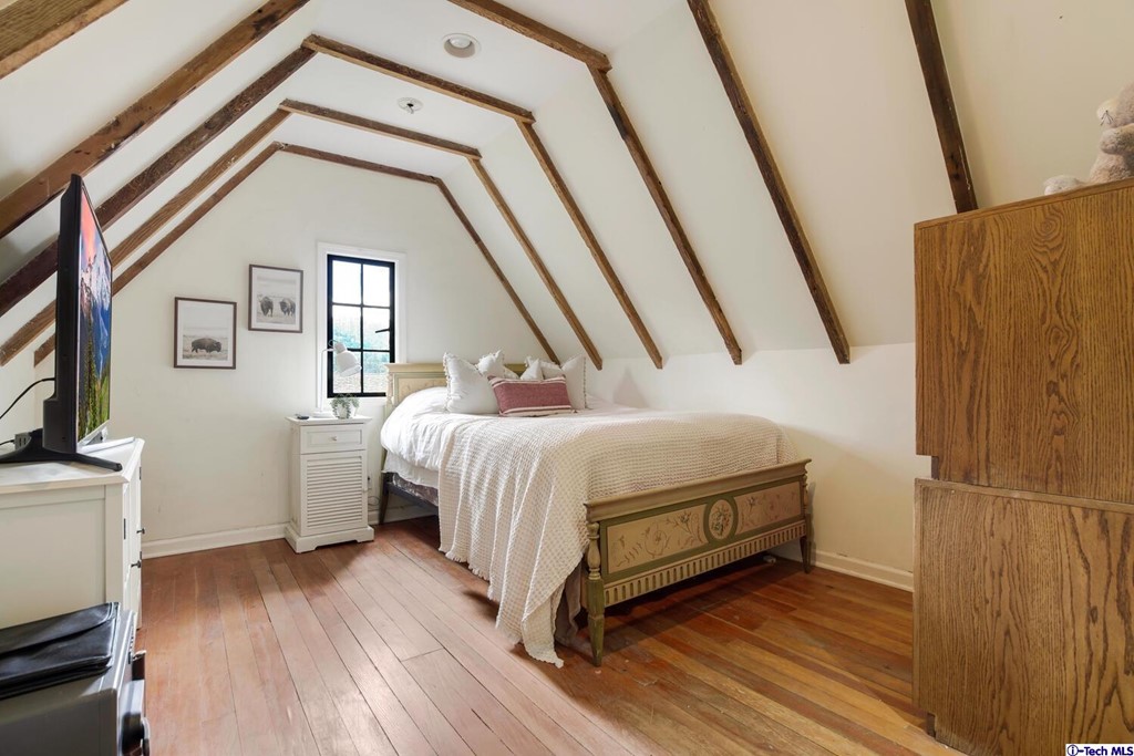 1705 Rancho Avenue Glendale, CA 91201 - Photo 39 of 53 a bedroom with a bed and wooden floor