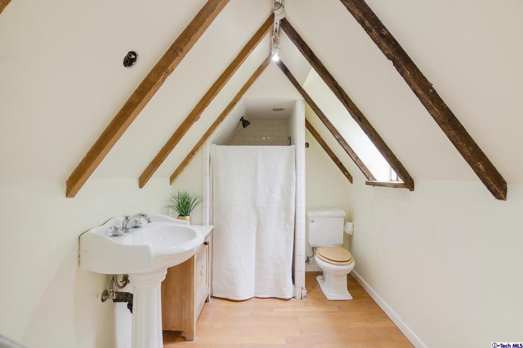 1705 Rancho Avenue Glendale, CA 91201 - Photo 40 of 53 a bathroom with a sink and mirror with toilet