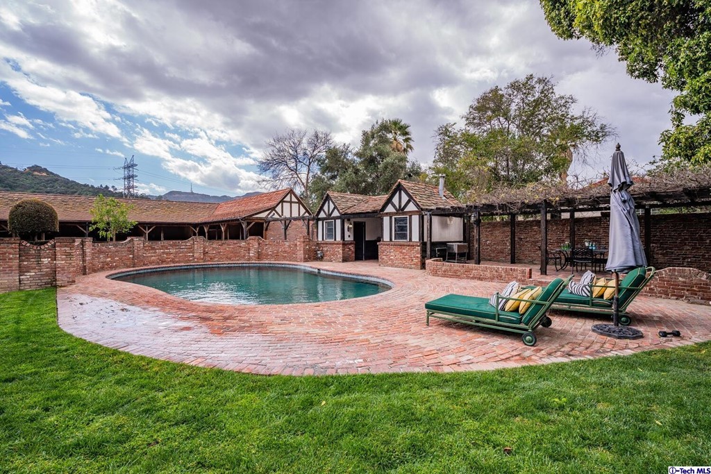 1705 Rancho Avenue Glendale, CA 91201 - Photo 48 of 53 a view of a house with backyard porch and sitting area