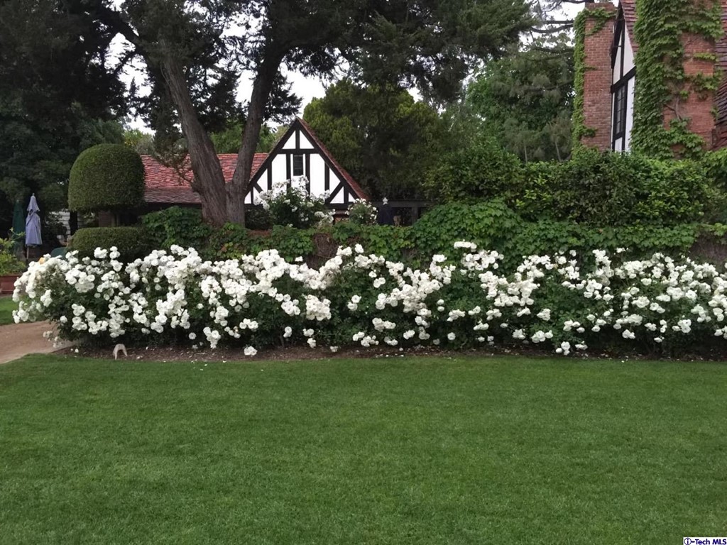 1705 Rancho Avenue Glendale, CA 91201 - Photo 8 of 53 a front view of a house with a garden