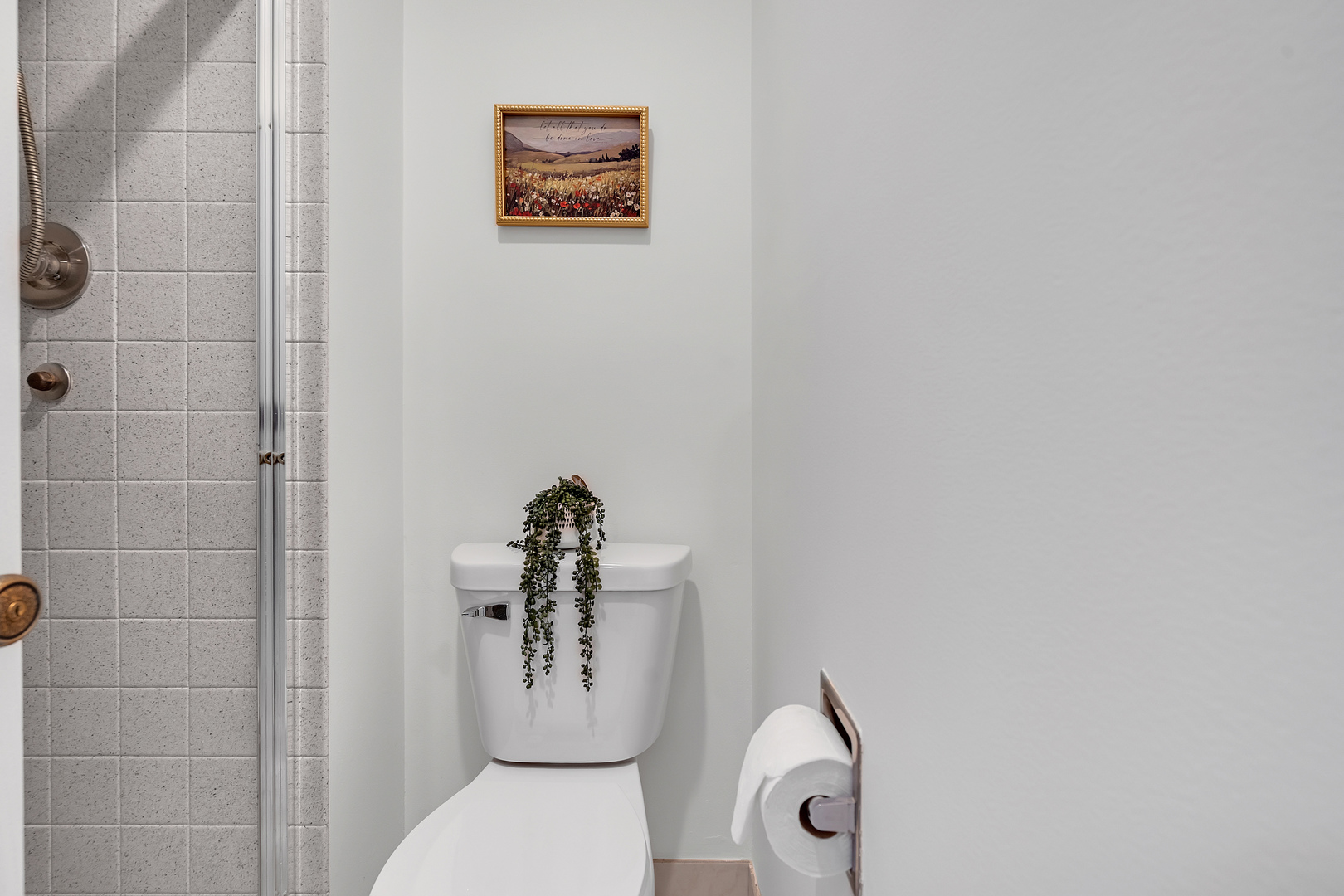 9240 Gross Point Road, Unit 410 Skokie, IL 60077 - Photo 13 of 26 a bathroom with a toilet and a shower