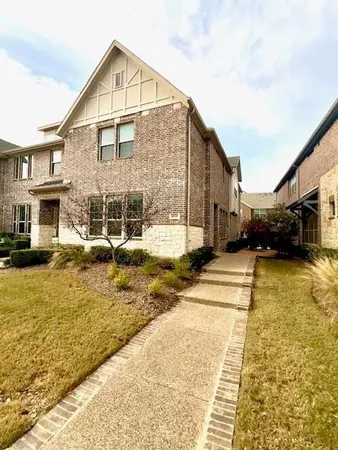 a view of residential houses with swimming pool