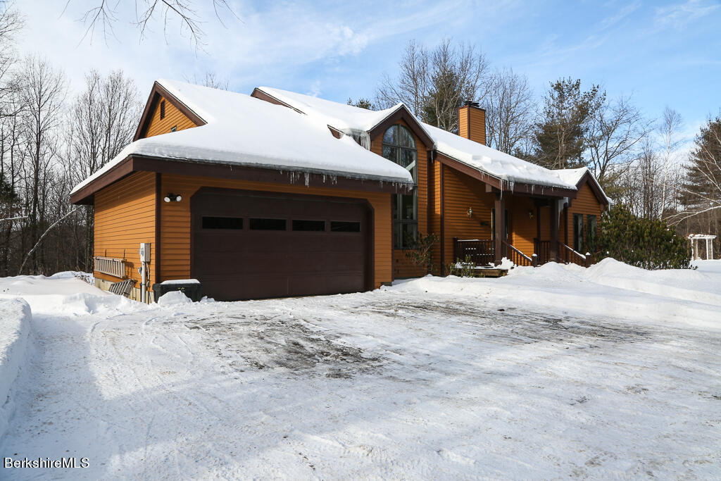 316 Johnson Hill Road Washington, MA 01223 - Photo 3 of 24 a view of a white house with a outdoor space