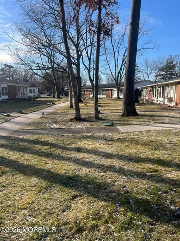 a view of road with trees