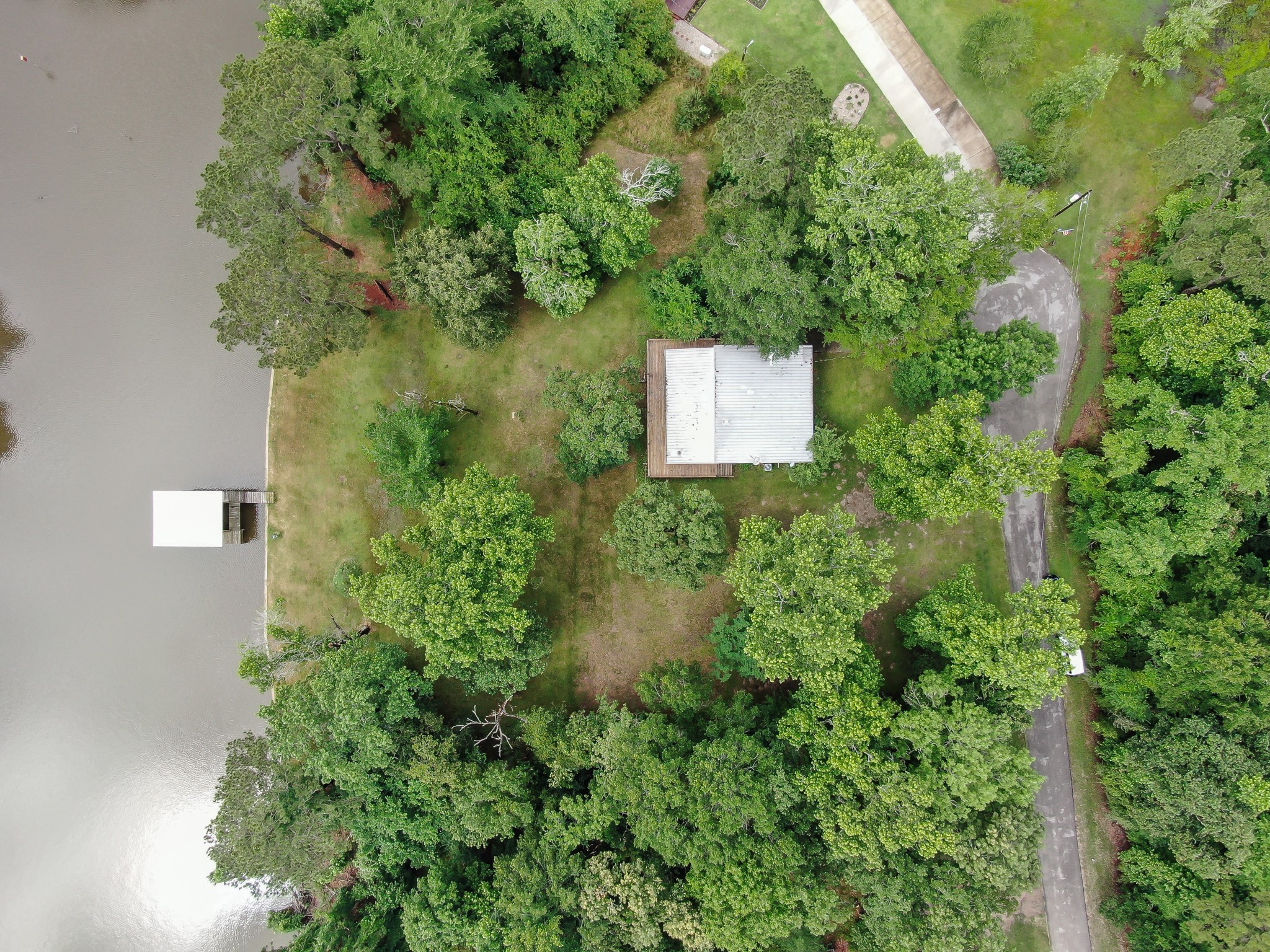 254 Sharp Lane Trinity, TX 75862 - Photo 27 of 36 an aerial view of a house with pool yard outdoor seating and yard