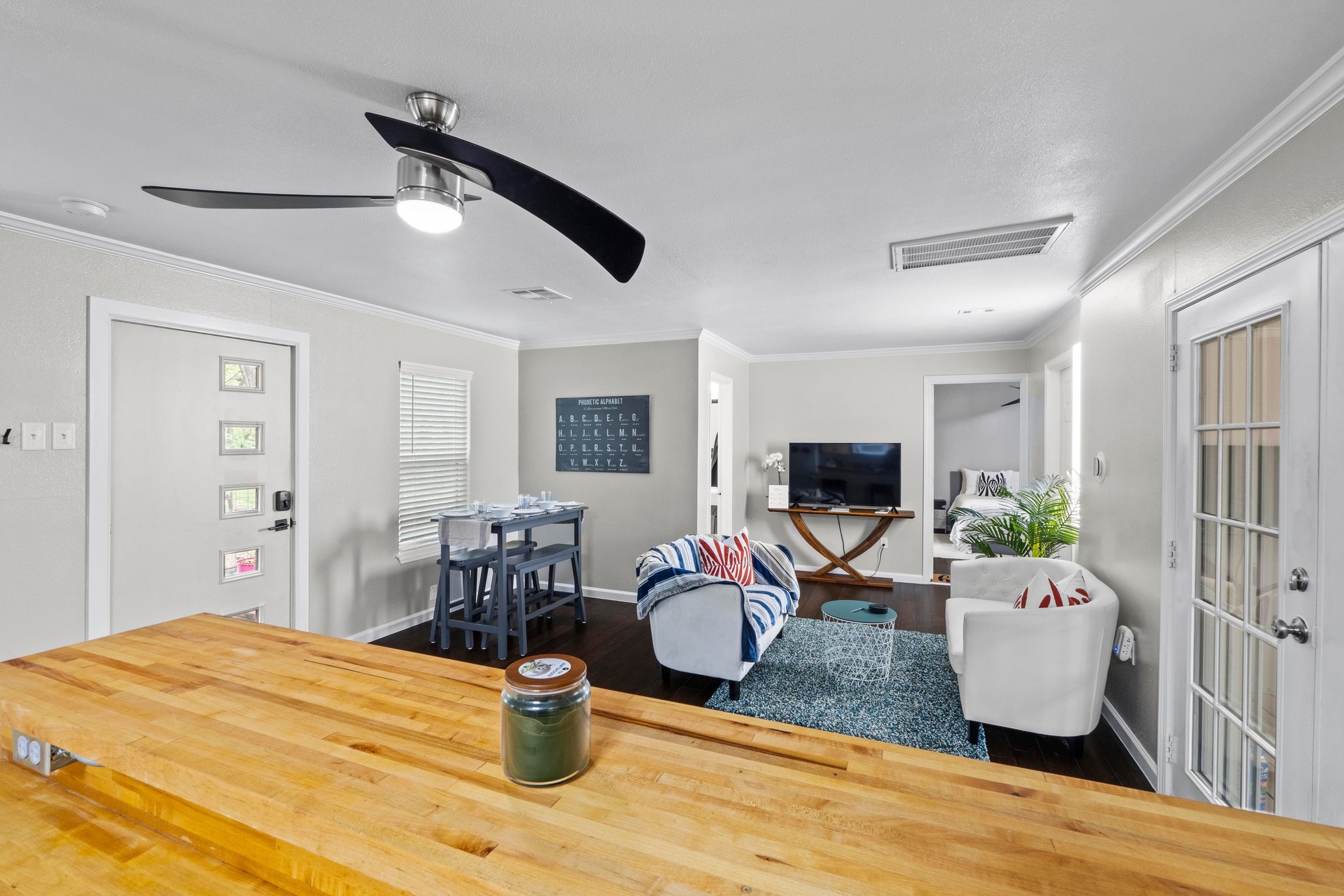 4512 Speedway, Unit A Austin, TX 78751 - Photo 20 of 39 a living room with furniture and a flat screen tv