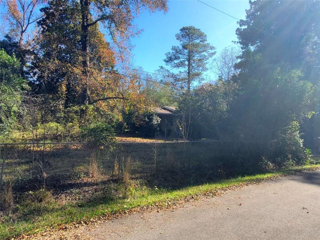 34 Ash Street Haddock, GA 31033 - Photo 11 of 24 a backyard of a house with lots of green space