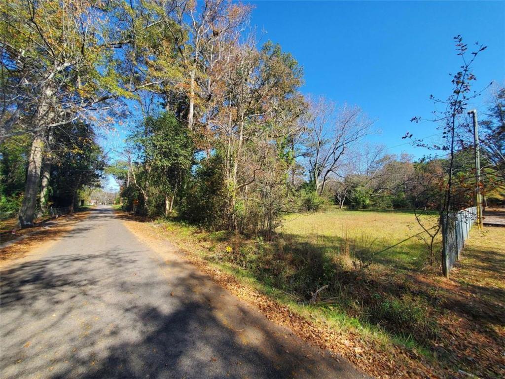 34 Ash Street Haddock, GA 31033 - Photo 24 of 24 a view of a yard with an trees