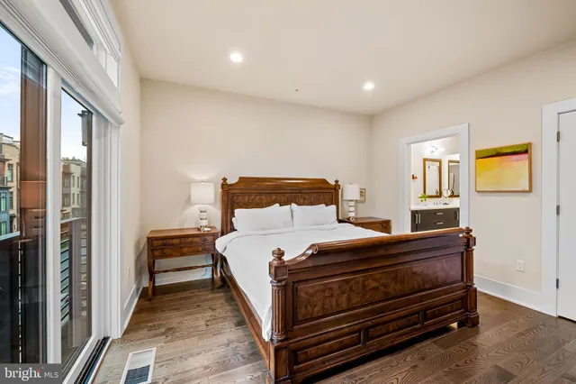a bathroom with a double vanity sink mirror double and shower