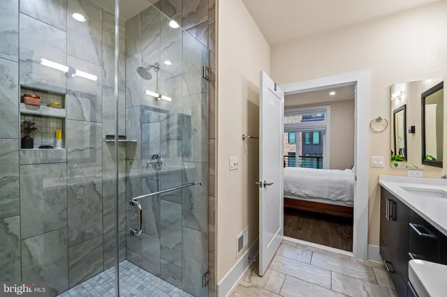 a kitchen with stainless steel appliances a stove and a refrigerator