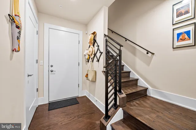 a living room with a couch and a dresser