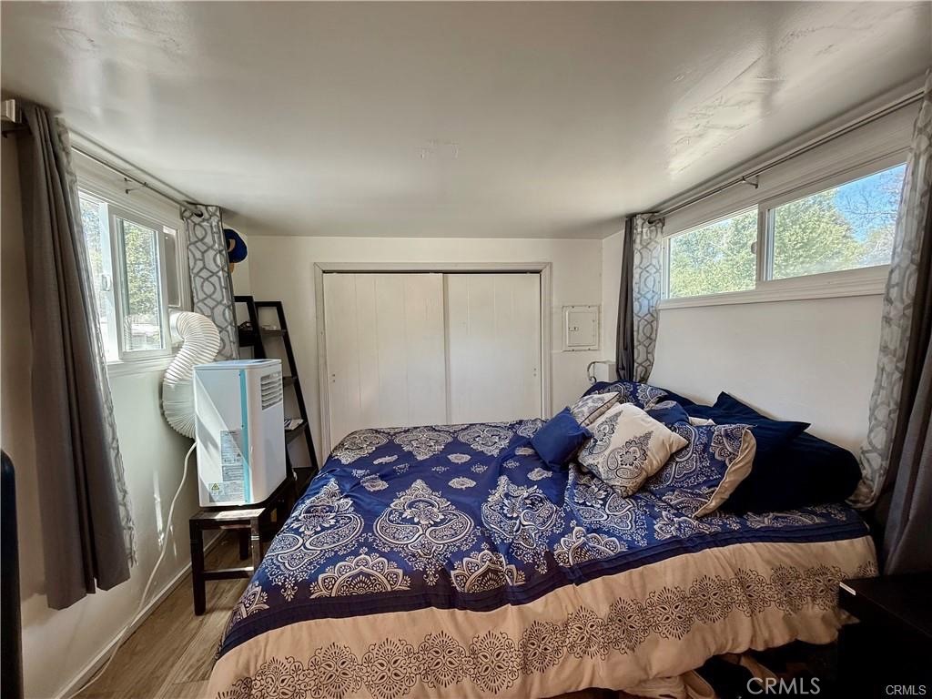 7665 Cache Creek Way Clearlake, CA 95422 - Photo 20 of 41 a bedroom with a bed and a window