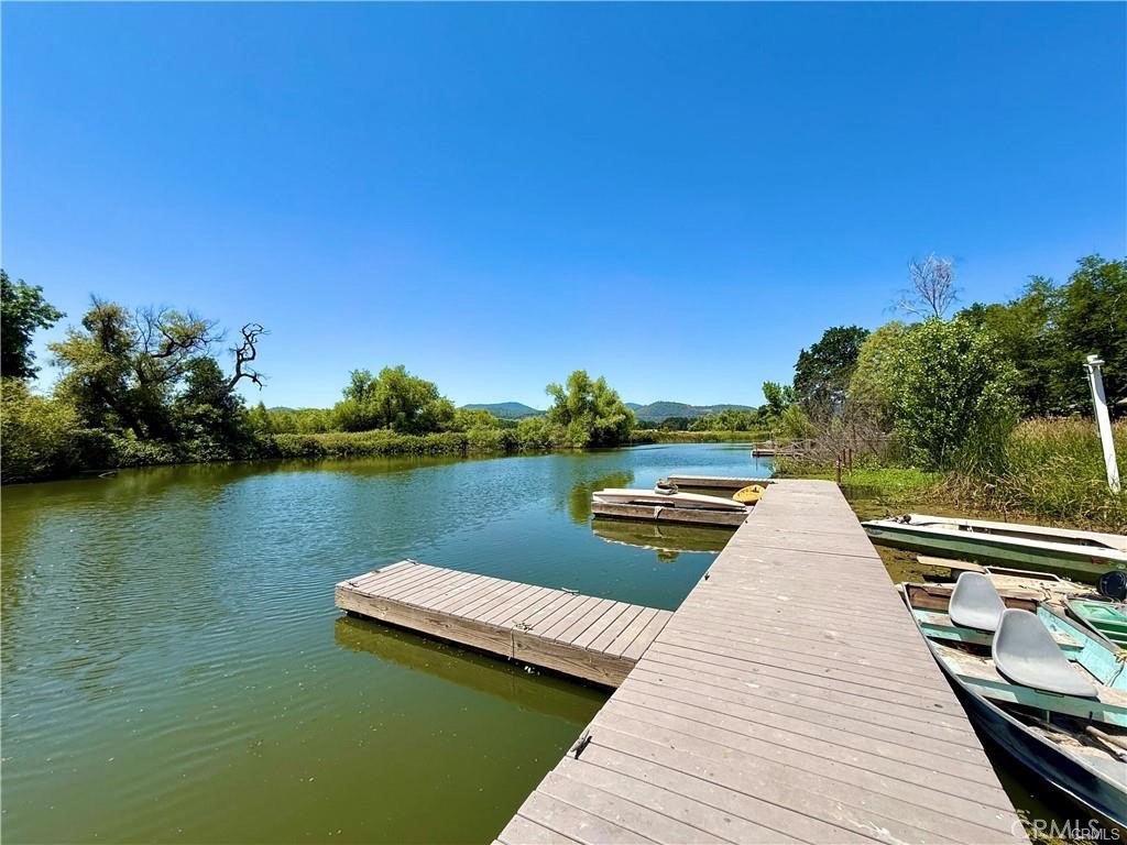 7665 Cache Creek Way Clearlake, CA 95422 - Photo 5 of 41 a view of a lake with outdoor space