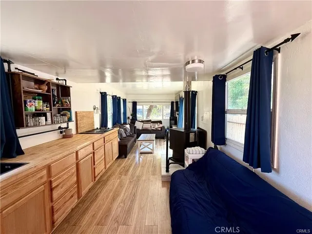 a view of a living room and dining room