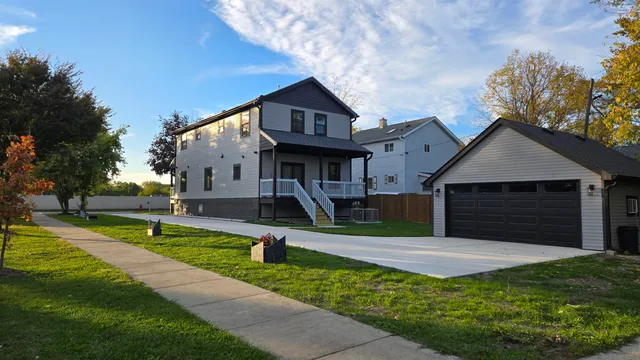 a front view of a house with yard