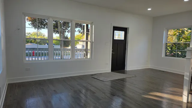 a view of livingroom with wooden floor