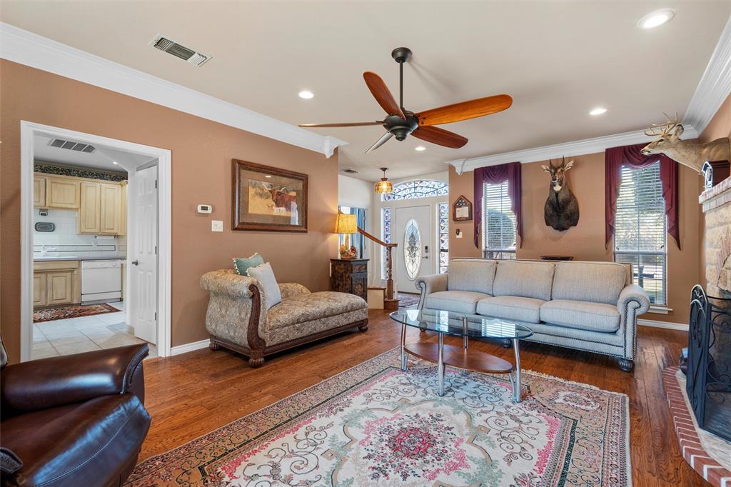 2114 Trace Ridge Drive Weatherford, TX 76087 - Photo 3 of 14 a living room with furniture and wooden floor