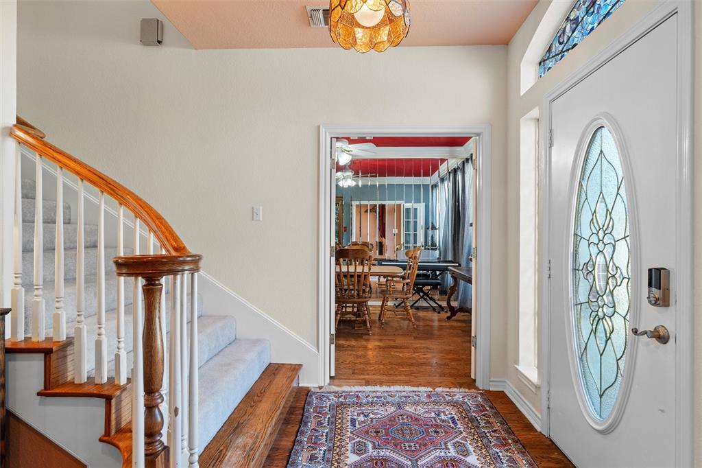 2114 Trace Ridge Drive Weatherford, TX 76087 - Photo 7 of 14 a view of livingroom with furniture and staircase
