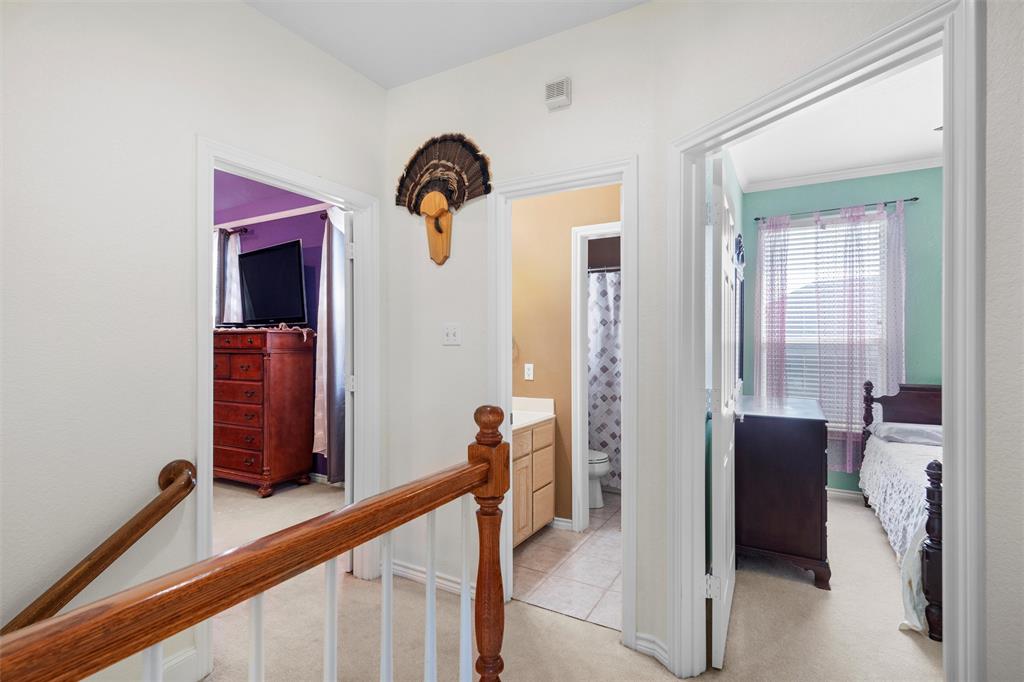 2114 Trace Ridge Drive Weatherford, TX 76087 - Photo 8 of 14 a view of a hallway with windows and stairs