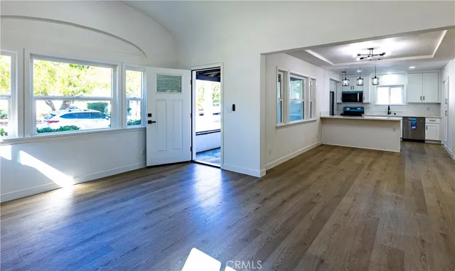 a view of a kitchen and dining room