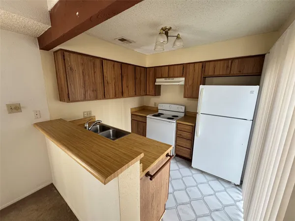 a bed room with a bed and furniture