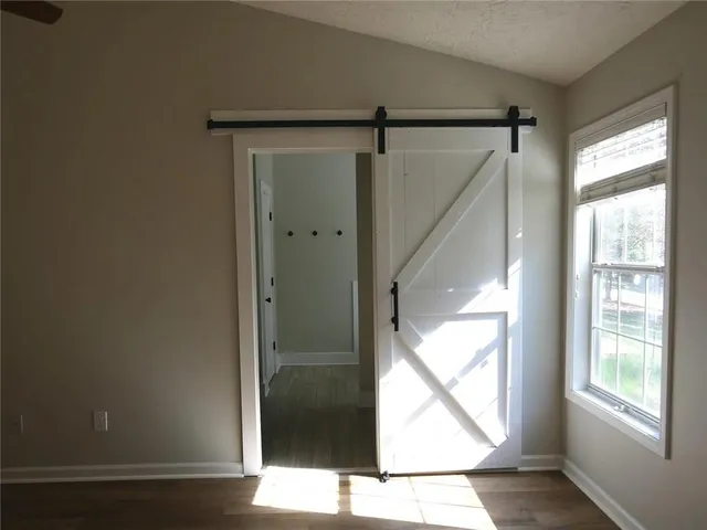a bathroom with double vanity sink and a mirror