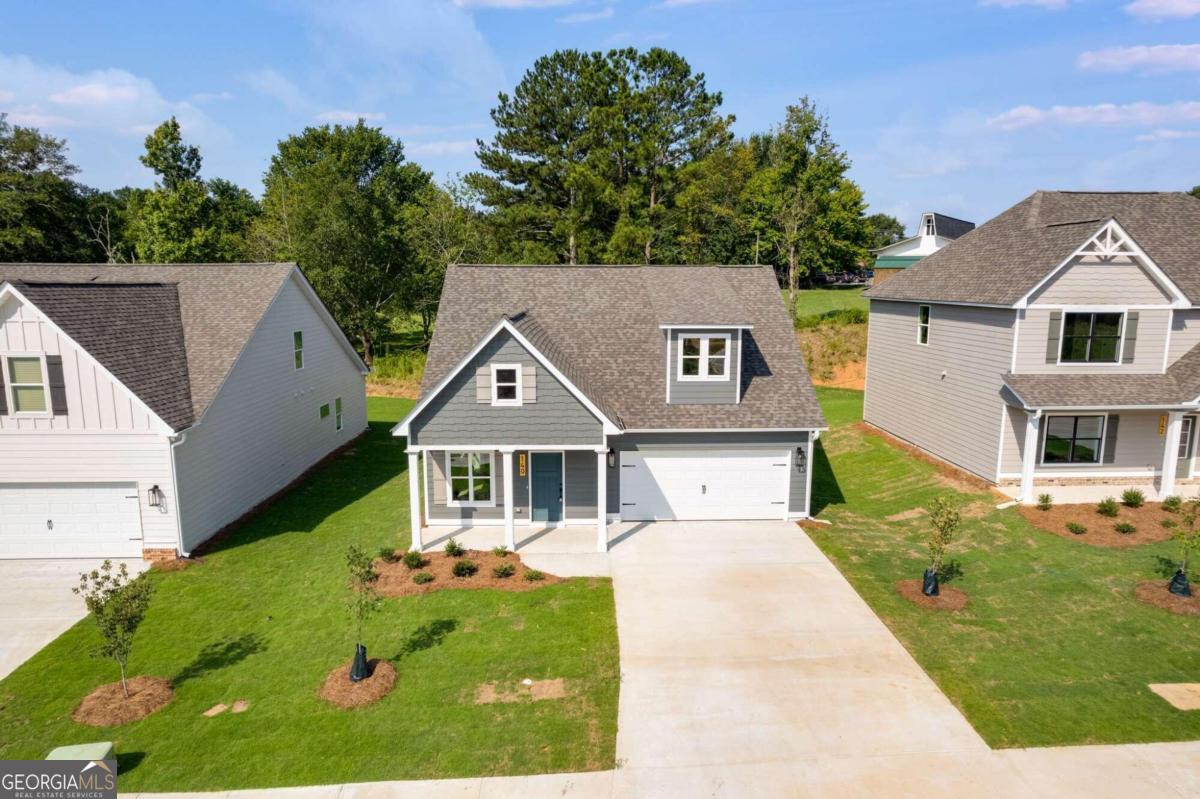 140 Cedar Pk Way Carrollton, GA 30117 - Photo 1 of 1 front view of a house with a yard
