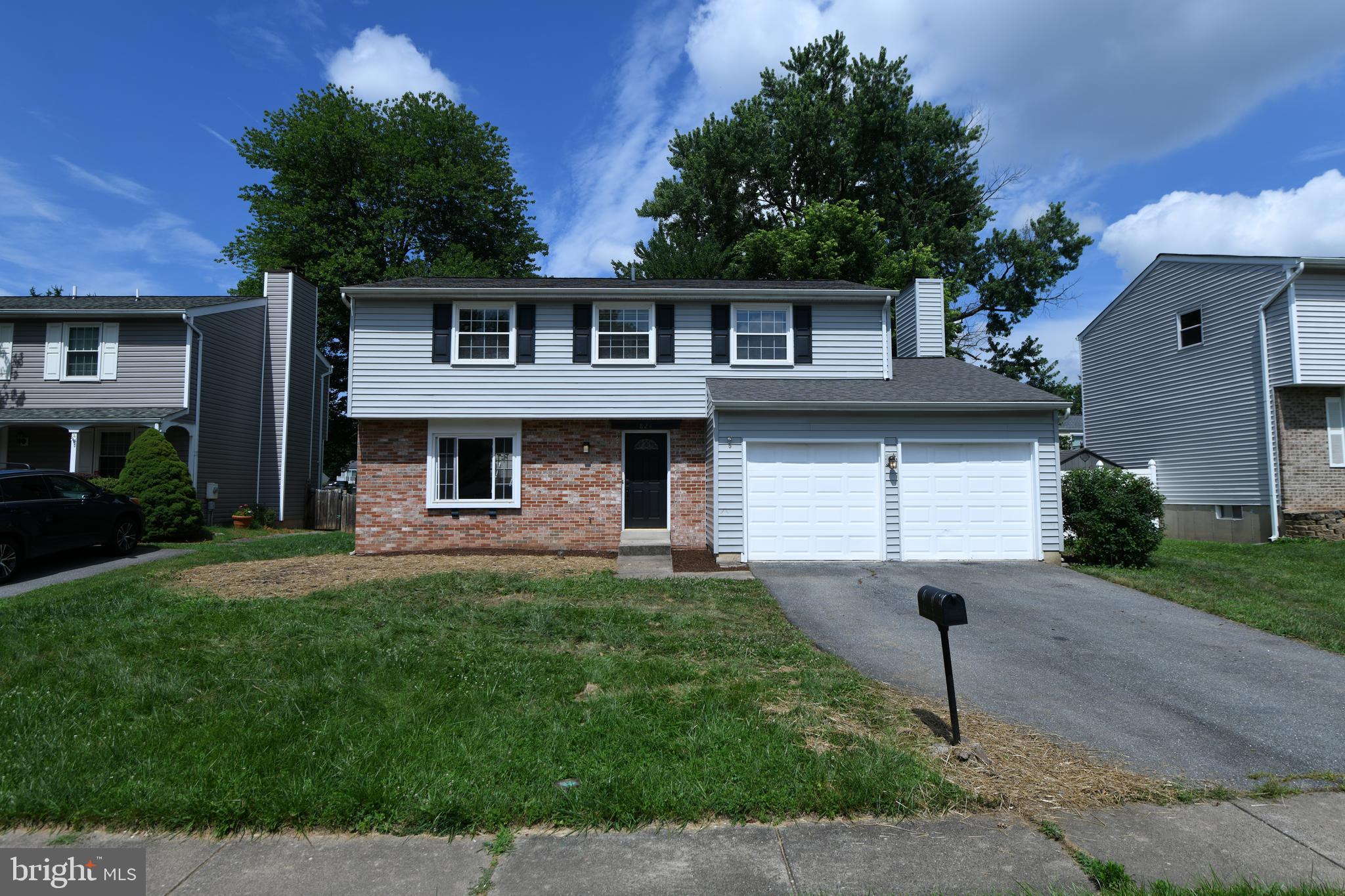 1824 Lawnview Drive Frederick, MD 21702 - Photo 21 of 21 a front view of a house with a yard and garage