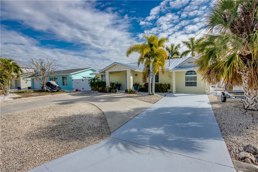 12262 Boat Shell Drive Matlacha Isles, FL 33991 - Photo 11 of 39 a view of the house with basketball court