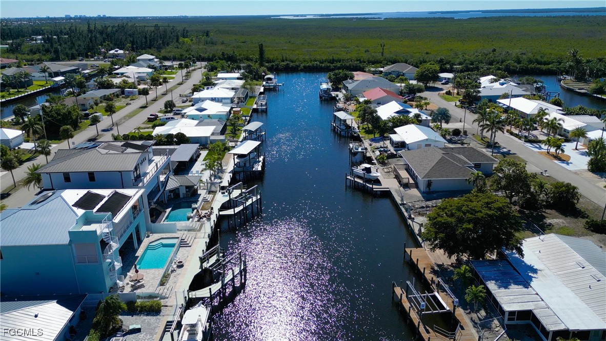 12262 Boat Shell Drive Matlacha Isles, FL 33991 - Photo 12 of 39 an aerial view of residential houses with outdoor space