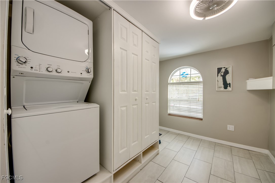 12262 Boat Shell Drive Matlacha Isles, FL 33991 - Photo 28 of 39 a view of a storage & utility room with a washer dryer