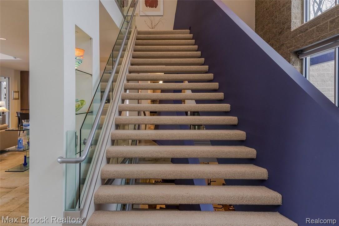 4455 Dow Ridge Road West Bloomfield, MI 48324 - Photo 4 of 50 A staircase as a piece of art with descending widths starting at 7'
