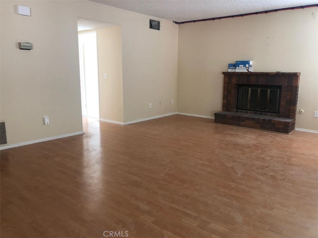 957 Silvertip Drive Diamond Bar, CA 91765 - Photo 3 of 14 a view of empty room with wooden floor