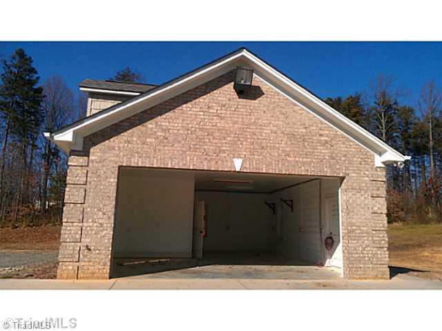1043 Virginia Farm Road King, NC 27021 - Photo 16 of 16 Parking Lot/Garage. Detached garage with storage/work space and half bath