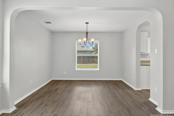 a room with window and wooden floor