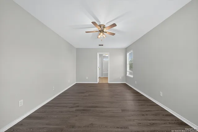 a view of an empty room with window