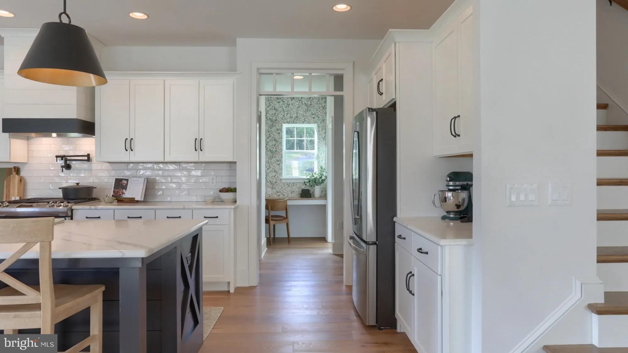 100 Flora Boulevard Lebanon, PA 17042 - Photo 12 of 24 a kitchen with a sink stove and cabinets
