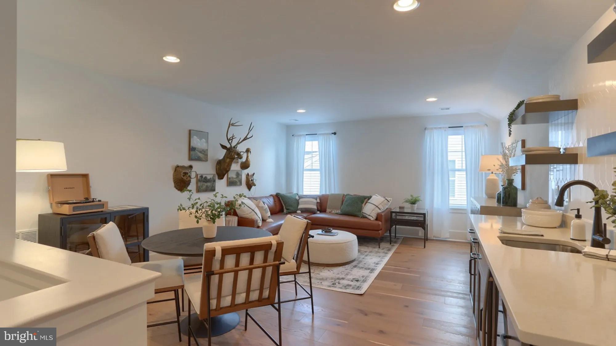 100 Flora Boulevard Lebanon, PA 17042 - Photo 19 of 24 a living room with furniture a fireplace and wooden floor
