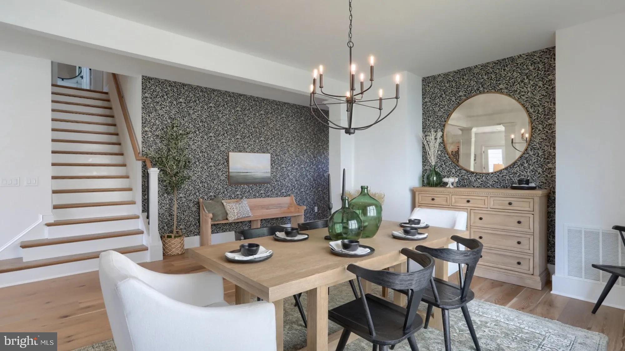 100 Flora Boulevard Lebanon, PA 17042 - Photo 2 of 24 a view of a dining room with furniture a chandelier and wooden floor