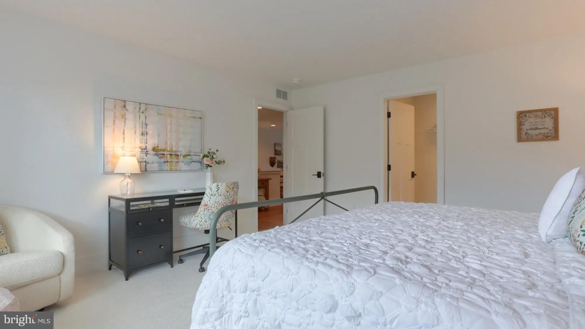 100 Flora Boulevard Lebanon, PA 17042 - Photo 23 of 24 a bedroom with a bed and a refrigerator