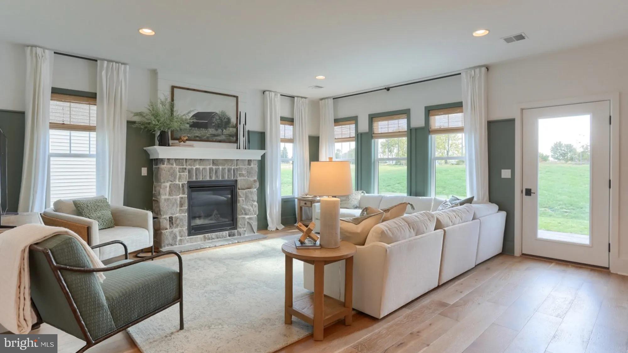 100 Flora Boulevard Lebanon, PA 17042 - Photo 4 of 24 a living room with furniture and a fireplace
