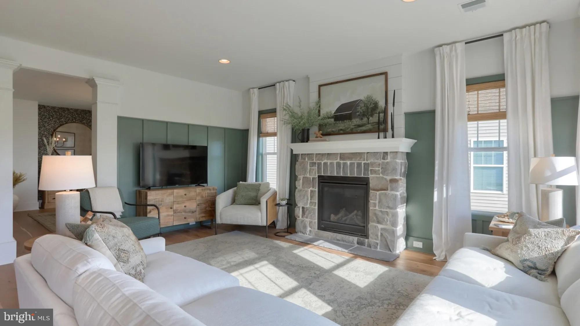 100 Flora Boulevard Lebanon, PA 17042 - Photo 5 of 24 a living room with furniture and a fireplace