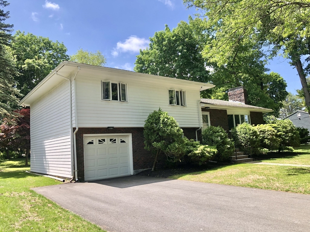 15 Sycamore Road Wakefield, MA 01880 - Photo 2 of 39 a view of a house with a garden