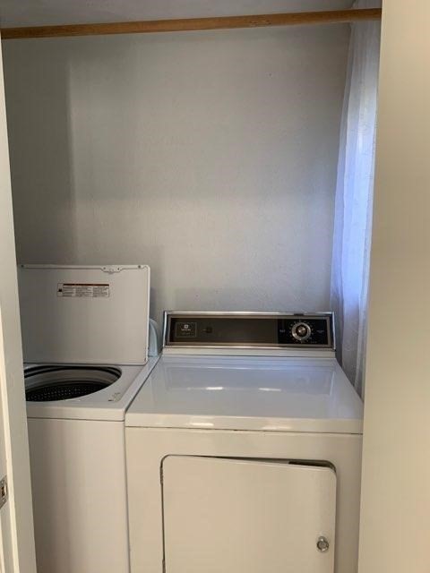 15 Sycamore Road Wakefield, MA 01880 - Photo 27 of 39 a utility room with dryer and washer