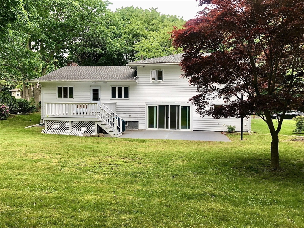 15 Sycamore Road Wakefield, MA 01880 - Photo 34 of 39 a view of a house with a yard