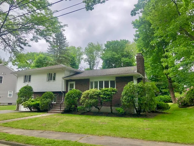a view of a house with a garden